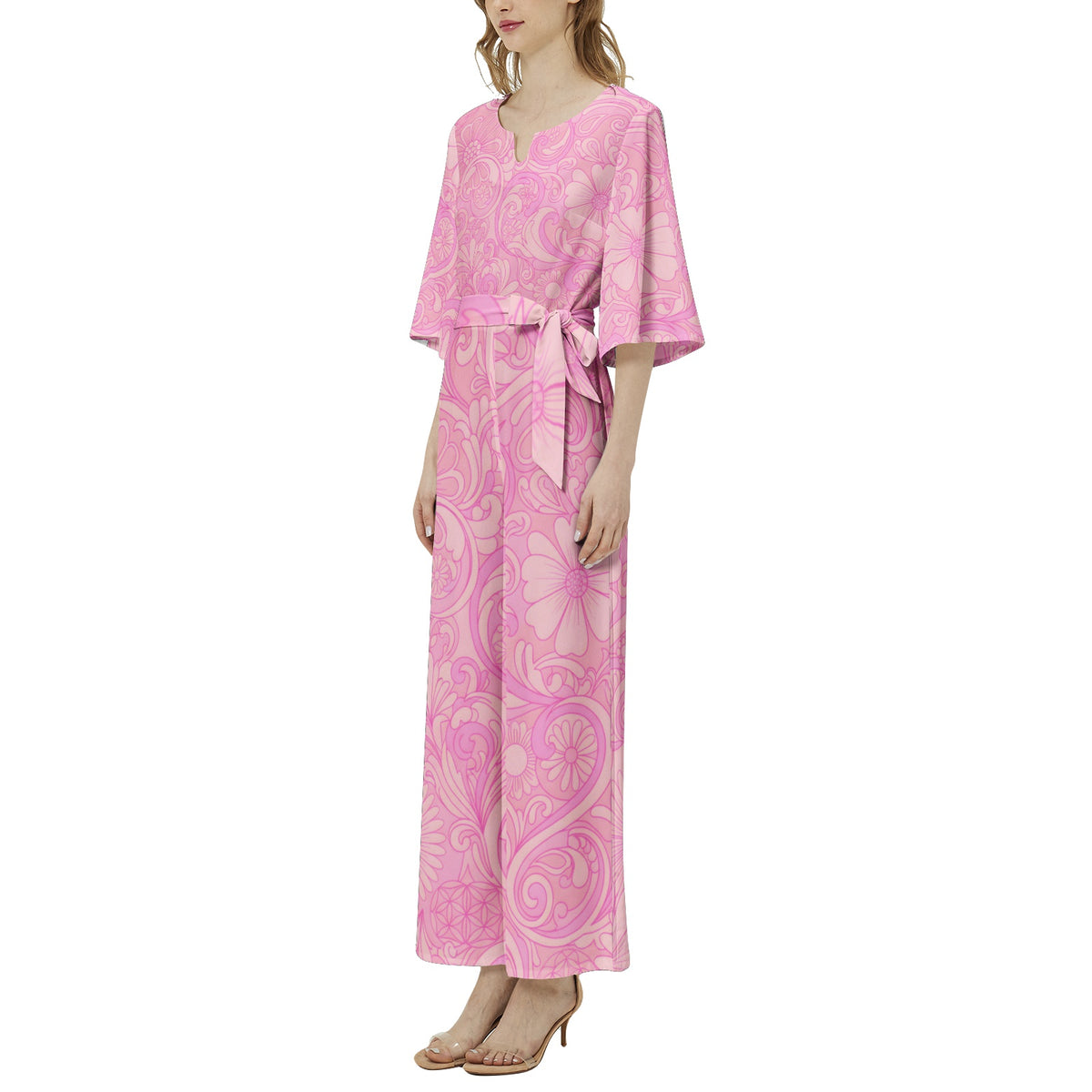 Women's retro floral wide leg jumpsuit with peach, pink, and lavender botanical print, dolman sleeves, and belted waist