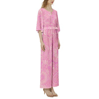 Women's retro floral wide leg jumpsuit with peach, pink, and lavender botanical print, dolman sleeves, and belted waist