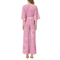 Women's retro floral wide leg jumpsuit with peach, pink, and lavender botanical print, dolman sleeves, and belted waist