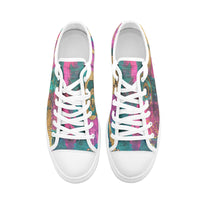 Unisex low-top canvas shoes with abstract color block pattern in turquoise, magenta, deep pink, and gold accents