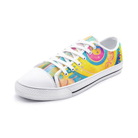 Low-top canvas shoes featuring a bold psychedelic abstract print in vibrant shades of blue, pink, purple, orange, and yellow. Modern designer sneakers with colorful swirling artwork, white laces, white rubber soles, and a contemporary streetwear aesthetic