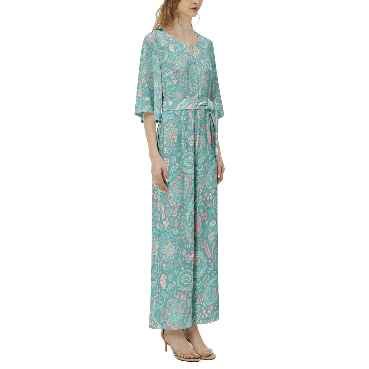 Women's pastel paisley jumpsuit with turquoise botanical print, notch neckline, and flowing wide leg silhouette