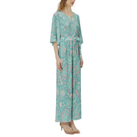 Women's pastel paisley jumpsuit with turquoise botanical print, notch neckline, and flowing wide leg silhouette