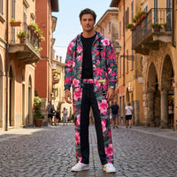 Unisex wide-leg joggers and hoodie with pink hibiscus floral print and tropical palm leaves