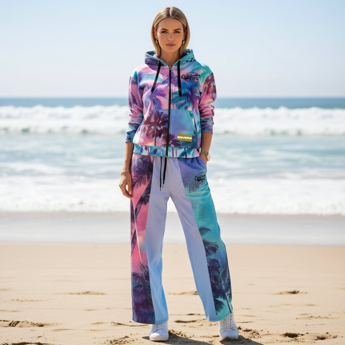 Unisex wide-leg joggers with neon palm tree print in pink, teal, lavender, and violet gradient tones