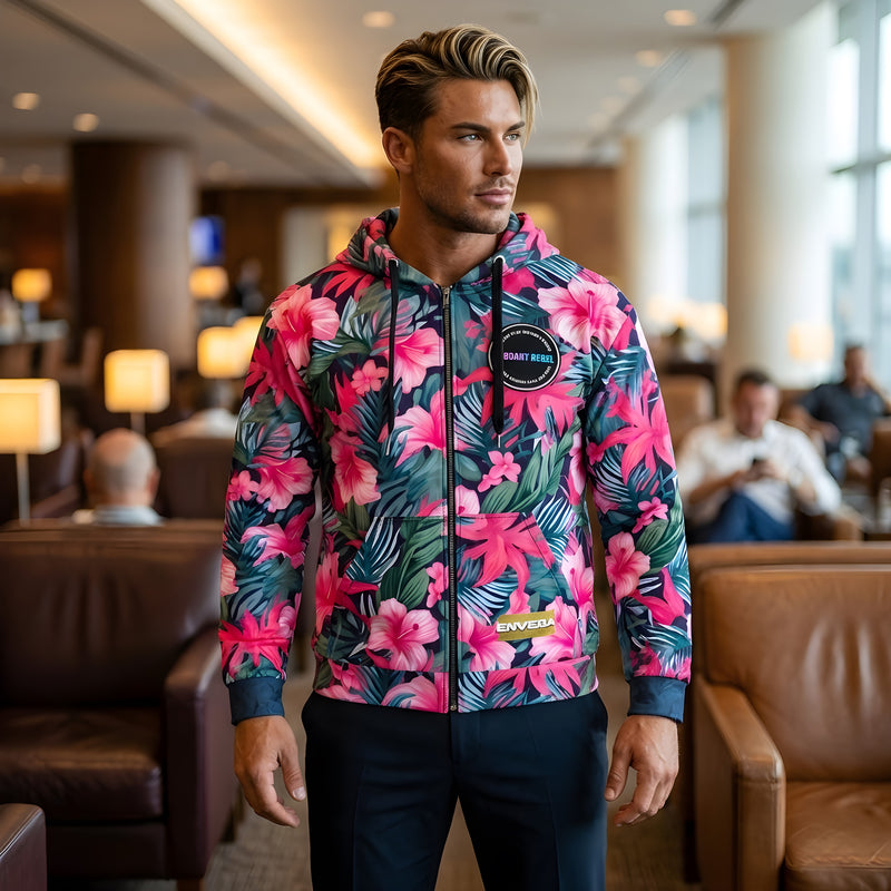 VIBRANT REBEL tropical floral zip hoodie with vibrant pink hibiscus flowers, lush green leaves, and bold botanical print