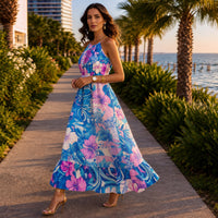 Women's French Riviera floral halter neck maxi dress in turquoise, lilac and soft pink, perfect for summer holidays