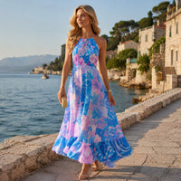 Women's French Riviera floral halter neck maxi dress in turquoise, lilac and soft pink, perfect for summer holidays