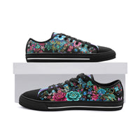 Colorful floral canvas sneakers with turquoise, pink, and blue botanical print and pastel striped tongue for men and women