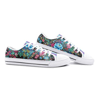 Colorful floral canvas sneakers with turquoise, pink, and blue botanical print and pastel striped tongue for men and women