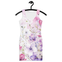 Bodycon mini dress with a watercolor floral print in soft pink, lavender, and white, featuring a fitted stretch silhouette