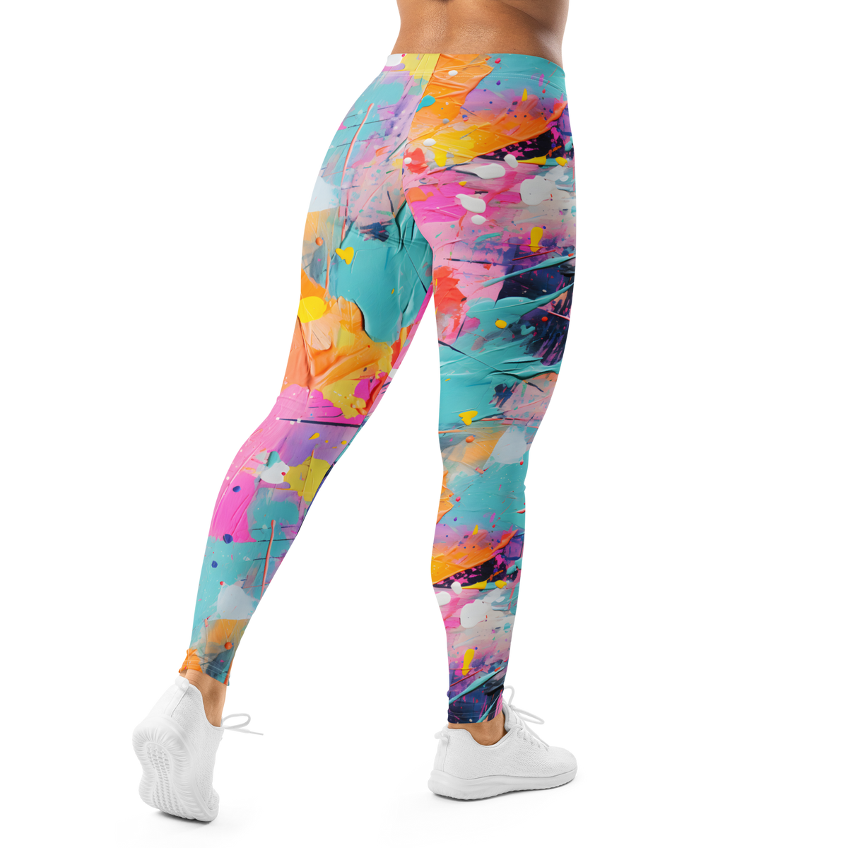 Women's colorful graphic leggings featuring an expressive paint splatter pattern in bright multicolor tones