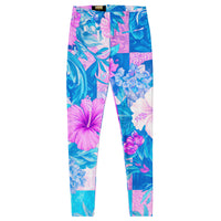 Tropical hibiscus floral leggings in vibrant blue and pink with a colorful botanical print, designed as island-inspired activewear and statement streetwear