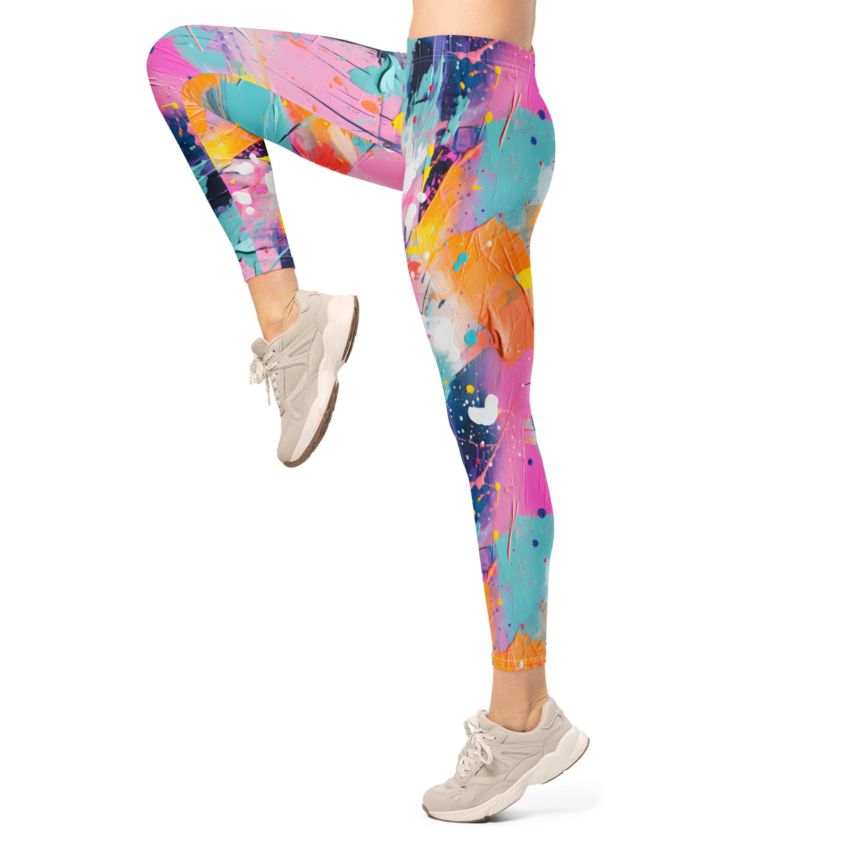 Women's colorful graphic leggings featuring an expressive paint splatter pattern in bright multicolor tones