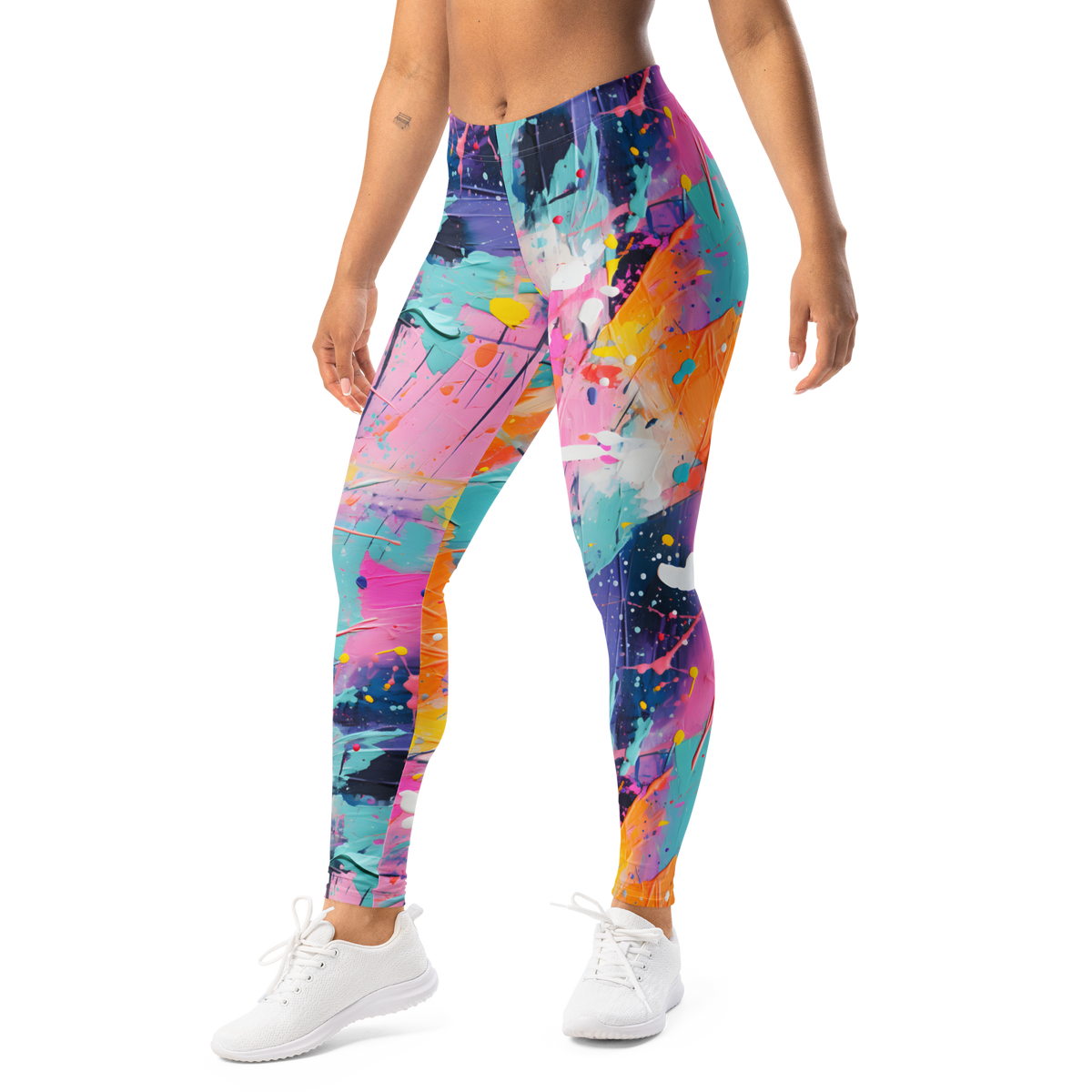 Women's colorful graphic leggings featuring an expressive paint splatter pattern in bright multicolor tones