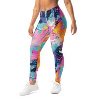 Women's colorful graphic leggings featuring an expressive paint splatter pattern in bright multicolor tones