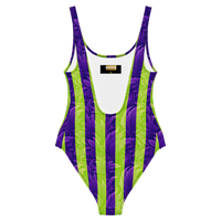 Women's one-piece swimsuit with vibrant purple and neon green vertical striped print and textured abstract design