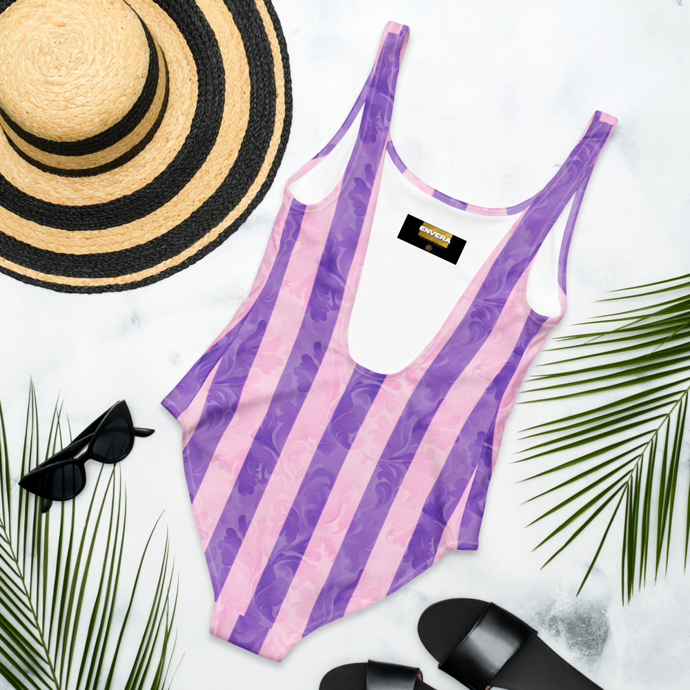 Elegant one-piece swimsuit with vertical purple and lavender stripes, textured details, flattering fit, perfect for stylish summer days.