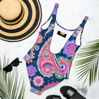 One-piece swimsuit with an intricate boho paisley mandala print in navy blue, pink, purple, green, coral, and white