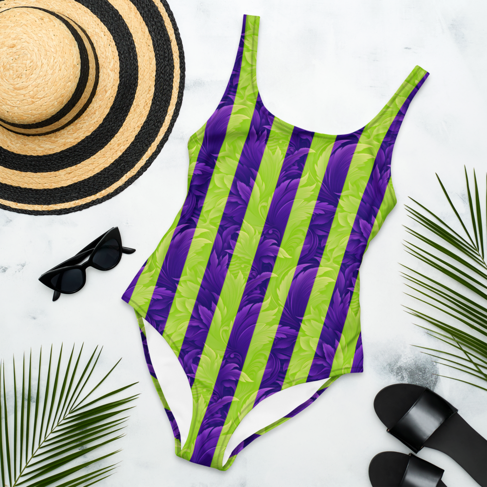 One-piece swimsuit with vibrant purple and neon green textured stripes, sculpting the silhouette with a striking, high-energy summer look.