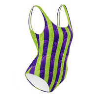 Women's one-piece swimsuit with vibrant purple and neon green vertical striped print and textured abstract design