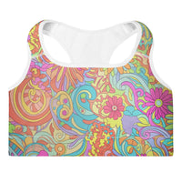 Women's retro inspired floral padded sports bra with colorful psychedelic flower print in turquoise, coral, lavender, and yellow