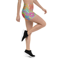 Women’s athletic shorts with vibrant retro floral psychedelic print and stretch fit waistband