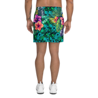Tropical Tiki performance shorts featuring vibrant tiki mask artwork with hibiscus flowers and jungle leaves in bold tropical streetwear design