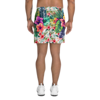 Tropical Tiki performance shorts featuring vibrant tiki mask artwork with hibiscus flowers and jungle leaves in bold tropical streetwear design