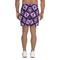 Deep purple athletic shorts with pastel pink geometric motifs and an all-over abstract tribal pattern