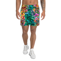 Tropical Tiki performance shorts featuring vibrant tiki mask artwork with hibiscus flowers and jungle leaves in bold tropical streetwear design