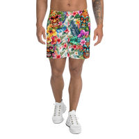 Tropical Tiki performance shorts featuring vibrant tiki mask artwork with hibiscus flowers and jungle leaves in bold tropical streetwear design