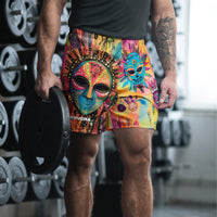 Long sports shorts featuring a vibrant psychedelic tribal mask print with expressive painted faces, decorative folk-art symbols, abstract shapes, brushstrokes, and colorful collage-like textures in turquoise, teal, coral, pink, magenta, orange, yellow, purple, black, and earthy tones. Unisex athletic design with a longer cut, elastic waistband, and bold artistic all-over pattern