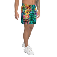 Tropical Tiki performance shorts featuring vibrant tiki mask artwork with hibiscus flowers and jungle leaves in bold tropical streetwear design