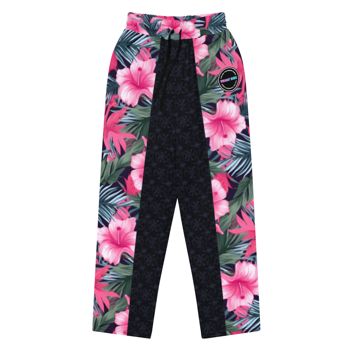 Vibrant Rebel tropical floral wide-leg joggers with vivid all-over pattern of hibiscus flowers and lush green leaves on a dark background