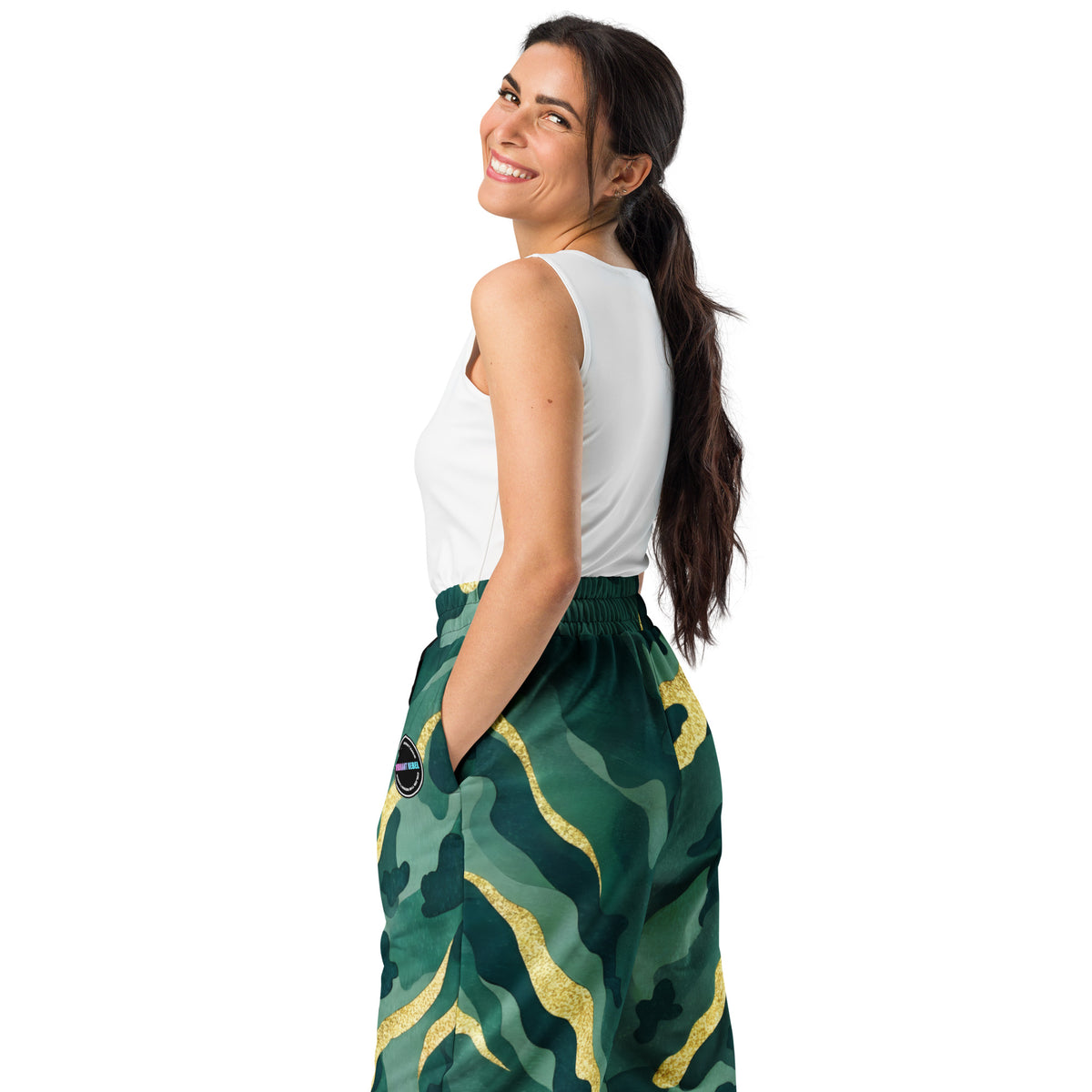 Unisex wide-leg joggers with abstract camouflage print in deep green and gold tones