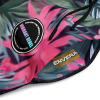 Vibrant Rebel tropical floral wide-leg joggers with vivid all-over pattern of hibiscus flowers and lush green leaves on a dark background