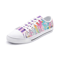 ENVERA colorful low top canvas sneakers with vibrant paint splash artwork and modern abstract design