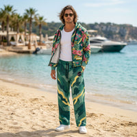 Unisex wide-leg joggers with abstract camouflage print in deep green and gold tones